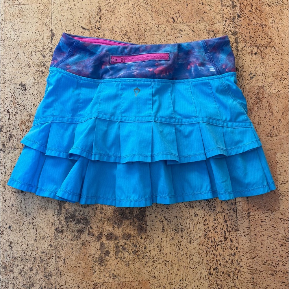 Ivivva by Lululemon “Set the Pace” blue pleated Skirt with Pink Highlights